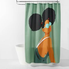 a shower curtain with an afro woman on it