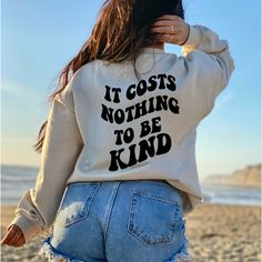 Positive Quote Be Kind Oversized Sweatshirt Aesthetic Gift Costs Nothing To BE KIND VSCO Sweatshirt Trendy Sweatshirt With Saying Back  SIZE Please refer to the size chart located in one of the listing photos. Note, these are unisex sweatshirts so they have a looser, comfy- fit and runs true to size. If you would like a more fitted look, please size down.  **PLEASE NOTE: Colors may seem different on the computer screen, or in the lighting in which the picture was taken ** CARE INSTRUCTIONS * Machine wash cold, inside-out, gentle cycle with mild detergent and similar colors. * Tumble dry low, or hang-dry for longest life. * Cool iron inside-out if necessary. Do not iron the design. * No bleach. No fabric softeners. * Do not dry clean. HOW TO ORDER: *  Select the size and color of the sweats Oversized Long Sleeve T-shirt With Lettering, Mbti Aesthetic, Oversized Sweatshirt Aesthetic, Quote Sweater, Citation Positive, Sweatshirt Aesthetic, Aesthetic Gift, Sweatshirt Trendy, Sweatshirts Quotes