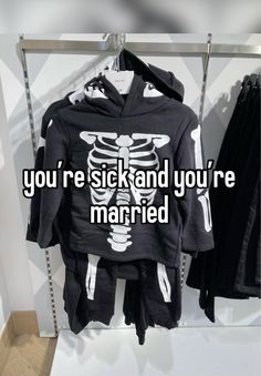 a couple of shirts that are hanging up on a rack with the words you're sick and you're married