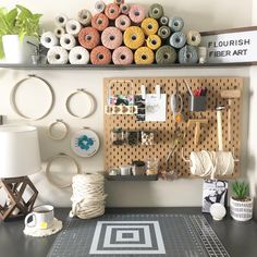 a craft room with various items on the wall