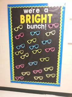 a bulletin board with glasses on it that says, we're a bright bunch