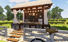 a small outdoor kitchen with steps leading up to it