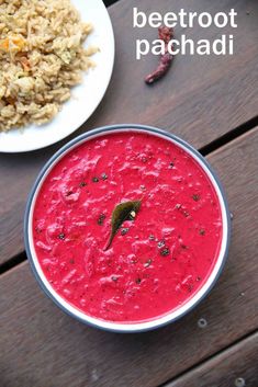 beetroot pachaddi served in a bowl with rice and raisins on the side