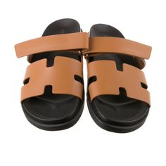 Brand New Authentic Hermes Chypre Sandals. Men’s Version By They Are Highly Sought After And Unisex. Calfskin, Natural Gold Color Size 42 Techno-Sandal In Calfskin With Anatomical Rubber Sole And Adjustable Strap. A Sleek Design For A Comfortable Casual Look. Size: 43 Eu Men Black Rubber Sole Black Calfskin Insole Black Goatskin Lining Made In Italy Modern Calf Leather Slides For Summer, Hermes Oran Sandals, Jean Sandals, Hermes Shoes, Vintage Hermes, Natural Gold, Gold Sandals, Black Braids, Blue Sandals