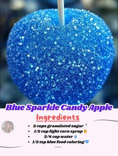 a blue sparkle candy apple on a stick