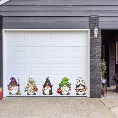 a garage door decorated with halloween decorations