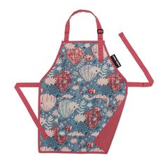 an apron with pink and blue designs on the front, featuring seashells and coral