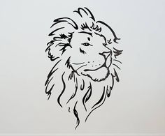 a drawing of a lion's face on a wall