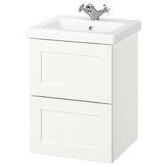 a white sink and cabinet with faucet on the top, in front of a white background