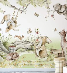 an animal themed wallpaper in a children's room with rabbits and other animals