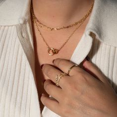 Our 14K Gold-Filled Interlocking necklace is a beautiful sentiment between loved ones, best friends, or mother and child. The charm pendant adds an elegant touch, and the intricate details will make you feel like your look is complete! - 14k gold-filled- Chain width: 2.5 mm.- Small circle 9mm, Large circle: 12.6mm- Chain length: 16" + 2" extension- Waterproof, Tarnish resistant & Hypoallergenic Elegant Link Charm Necklaces For Gifts, Elegant Link Charm Necklace For Gift, Gold Plated Link Jewelry For Anniversary, Wedding 14k Gold Clavicle Chain Charm Necklaces, Dainty 14k Gold Wedding Chain Necklace, Elegant 14k Gold Filled Charm Necklace For Mother's Day, Gold Plated Charm Necklace With Adjustable Chain For Anniversary, Gold-plated Charm Necklace With Adjustable Chain For Anniversary, Adjustable Gold Plated Charm Necklaces For Anniversary