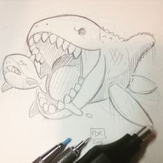 a drawing of a shark with its mouth open