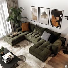 a living room filled with furniture and pictures on the wall