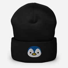 This Baby Penguin Beanie Cap is a must-have for any animal lover! With its charming embroidered design and hand-crafted details, this cuffed beanie will keep you warm and stylish. Made with high-quality materials, it's the perfect gift for any occasion. Embrace the flightless birds trend with this adorable hat. A snug, form-fitting beanie. It's not only a great head-warming piece but a staple accessory in anyone's wardrobe. • 100% Turbo Acrylic • 12″ (30 cm) in length • Hypoallergenic • Unisex s Cute Black Beanie (one Size Fits Most), Cute Black Beanie (one Size), Cute Black Beanie One Size, Black Embroidered Beanie, One Size Fits Most, Black Embroidered Beanie One Size, Cute Black Beanie, Funny Black Hats For Gifts, Funny Black Hats For Gift, Funny Black Hat For Gift