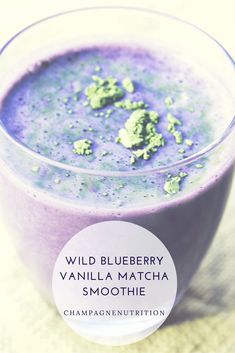 a blueberry vanilla matcha smoothie in a glass