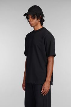 T-Shirt in black cotton, round neck, short sleeves, embroidered logo on front, back print, straight hem, 100% cotton, Made in Turkey, Model is 1. 83 and wears size M Berlin Club, Maurice Lacroix, John Lobb, Black Cotton, Boat Shoes, Shoe Laces, Dolce And Gabbana, Round Neck, Short Sleeves