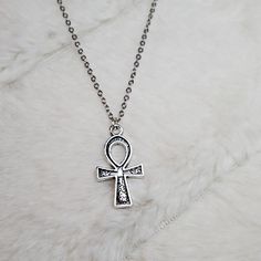 Small Ankh Charm Necklace. Charms Are Approximately 25x14mm. Comes On A 16 Inch Stainless Steel Chain With A Lobster Clasp And 1.5 Inch Extension Chain. #Ankh #Egypt #Cross #Charm #Necklace Spiritual Ankh Necklace With Adjustable Chain, Adjustable Silver Ankh Necklace, Silver Ankh Symbolic Necklace, Nickel-free Ankh Necklace As Gift, Silver Ankh Amulet Necklace, Lime Green Necklace, Cross Charm Necklace, Ankh Necklace, Lucky Charm Necklace