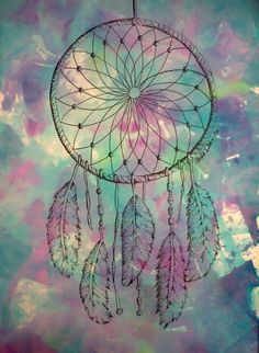 a drawing of a dream catcher with feathers hanging from it's side on a blue, pink and green background