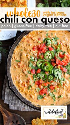 a pizza topped with cheese and vegetables on top of a pan