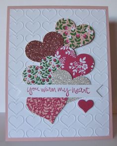 a card with hearts on it and the words you warm my heart