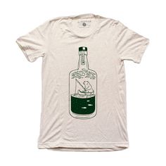 You've heard of a genie in a bottle but have you ever seen a bear fishing in a whiskey bottle? Neither have your friends so prove it with this tee! The Moore Whiskey Bear Tee in oatmeal is a screen printed t shirt with forest green water-based ink. With a retail fit, this incredibly soft t shirt is made out of a tri-blend of 50% polyester, 25% cotton, and 25% rayon. Our soft mens t shirts are unisex in wear. Design inspiration: "This design is a collab with Mountain Khaki. The goal of the collab Tshirt Design Inspiration, Shirt Design Inspiration, Screen Printing Shirts, Bear T Shirt, Fishing T Shirts, Mens T Shirts, Fishing Shirts, Apparel Design, Forest Green