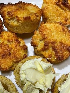 some fried food is on a white plate with ice cream and butter in the middle