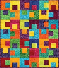 a multicolored quilt with squares and rectangles in the center, on a purple background