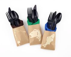 three forks and two bags with different designs on them