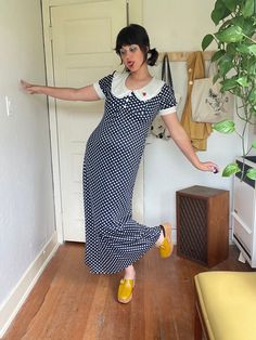 1970s nylon polka dot maxi dress with the cutest rounded collar and a lil rose applique. Obsessed!  PTP 17-21" Empire waist 14.5-17.5" Natural waist 18.5" + stretch  Hips 24" + stretch  Length 56" Retro Polka Dot Dress For Daywear, Retro Polka Dot Day Dresses, Retro Fitted Maxi Vintage Dress, Fitted Retro Maxi Vintage Dress, Fitted Retro Maxi Length Vintage Dress, Retro Full-length Fitted Dress, Retro Fitted Full-length Dress, Full Length Fitted Retro Dress, Twee Fashion Outfits