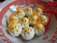 there are many little chicks in an egg shell on the plate with happy birthday message