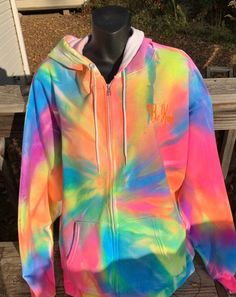 I had a customer message me wanting a custom zip up hoodie. As a small business owner you want to make your customers happy and make them what they ask for. This zip up came out better than I had ever imagined. We set out to do custom orders and hope it turns out right because this is what we do this for. :)  I ran this by my mom and my 13 year old daughter and they both want one now! LOL  Each zip up is 60% cotton and 40% polyester.  EverSoft Ring Spun Cotton Provides Premium Softness Wash after Wash Double-needle stitching on the neck and hems for durability Ribbed collar, cuffs, and waistband that hold their shape Shoulder-to-shoulder neck tape for comfort and durability I use unisex zip ups because they give you just a little more room if you have something thicker on underneath.  Thes Trendy Tie Dye Hoodie For Streetwear, Rainbow Tie Dye Hoodie, Neon Tie Dye, Unique Tie Dye, Colorful Wardrobe, Tie Dye Rainbow, Rainbow Tie Dye, Rainbow Fashion, Unique Ties