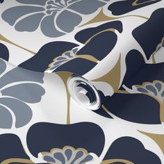 blue and gold floral wallpaper with large flowers on the side, in an elegant pattern