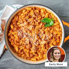 a large pot filled with pasta and sauce next to a smiling woman's face