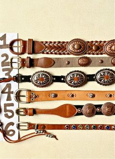 "Concho Belt Genuine Leather Southwestern Western Country Cowgirl Vintage Upcycle CHOOSE ONE  ....CHOOSE ONE (of 6) Upcycled & Vintage Belts: Genuine Leather, metal concho, studs ....From TOP to BOTTOM in 1st pic.  1)  Split Leather, Copper concho & spots, Brown weave, 34 long, 1\" wide, poke in 29-31\" size 30, $40 2) Brass Buckle, Copper concho & spots, genuine Leather, tan strapping, 38 long, 1\" wide, 5 holes 32.5-35.5\", size 34, $38 3) Vintage Black Suede Tie, Silver Concho, 35\" plus long Western Belt Buckles Wild West Living, Western Accessories Women, Leather Upcycle, Western Belts For Women, Country Belts, Belts Vintage, Brown Weave, Vintage Upcycle, Cowgirl Vintage