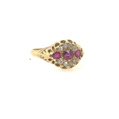 Beautiful, antique, Victorian ring with three old cut rubies and eight old cut diamonds, all crafted in 18k yellow gold.  Fantastic cluster of stones,  the rubies could be Burmese.  Ring measures 2cm x9mm and weighs 3.3grams.  Ring size 9.  Ring is from a London estate.   Rubies.50cttw Diamonds .24cttw Yellow Gold Ruby Rings With Single Cut Diamonds, Antique Ruby Ring With Single Cut Diamonds, Yellow Gold Diamond Ring With Rose Cut Ruby, Antique Ruby Rings With Single Cut Diamonds, Victorian Multi-stone Yellow Gold Diamond Ring, Antique Red Diamond Ring With Rose Cut Diamonds, Antique Style Brilliant Cut Yellow Gold Ruby Ring, Victorian Ruby Ring With Diamond, Antique Yellow Gold Ruby Ring With Brilliant Cut