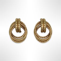 ⚓14k Gold Vintage Knot Earrings Solid 14k gold, stamped 14k. Not filled or plated.  Excellent condition! We sell the highest quality vintage and pre-owned items! Free domestic shipping always! On its way to you in 1 business day.  30 day return policy!  ⚓The Details 1 inch long  0.5 inch wide 2.4 grams each ⚓Who We Are  We are a small, family-owned business in Plymouth, MA. Located in the heart of Main Street, Main Street Jewelry Co.'s mission is to find one-of-a-kind, unique pieces. Vintage, antiques, and rare finds are our specialty, of course other than our brand new Italian silver chains with a price that can't be beat. We thank you for supporting small businesses everywhere and checking out our shop! Vintage Yellow Gold Plated Clip-on Earrings, Vintage 14k Yellow Gold Earrings, Clip-on Gold Jewelry In 14k Gold, Gold 14k Gold Clip-on Jewelry, Clip-on 14k Gold Jewelry, Gold Earrings Stamped 14k Fine Jewelry, Gold Oval Earrings Stamped 14k, Gold-plated Gold Clip-on Earrings For Anniversary, Gold Round Clip-on Earrings Fine Jewelry