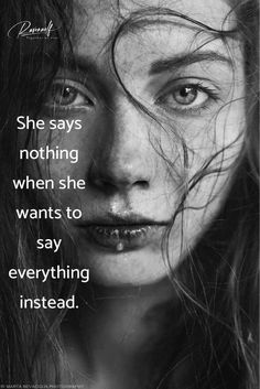 a woman's face with the words, she says nothing when she wants to say everything