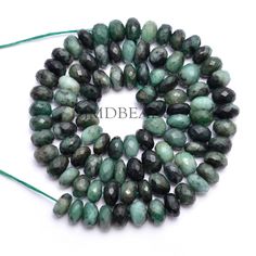 green and black agate beads with green string