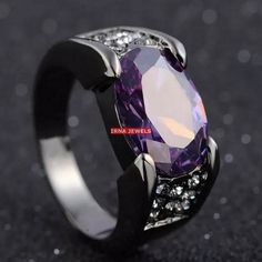 Natural Amethyst Ring Beautiful Surprise Wedding Gift This Beautiful Ring is Made of Natural Amethyst and blend with Solid 925 Sterling Silver. Item Description Mainstone - Amethyst Jewelry Type - Ring Material - 925 Sterling Silver Gender - Men Metal Purity - 925 Color - Purple Stone Treatment - None About Gemstone - Amethyst is linked to the element of wind. It is believed to prevent intoxication. This purple gemstone is associated with Royalty. This stone has amazing healing power and very he Rings Elegant, Pomegranate Jewelry, Obsidian Ring, Black Gold Ring, Vintage Jewellery Rings, Purple Rings, Ring Trends, Black Ring, Jewelry Black