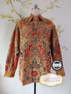 Peranakan Baba Hand-drawn Batik Shirt. Long Sleeve on Textured Silk. Size: L Material: Textured silk Technique: Full hand-drawn batik Detail: Hidden button & chest pocket Other: Lining inside For more details and products, please visit www.littlenyonyabatik.com Shipping information: Kindly furnish your contact number for shipping purposes. This information is essential and must be provided as per the courier's requirements to prevent any potential delays in the shipping process. Please be aware Traditional Silk Top With Floral Print, Traditional Long Sleeve Shirt With Motif, Traditional Batik Print Tops For Festive Season, Traditional Batik Print Tops For Festive Occasion, Traditional Patterned Blouse With Motif, Batik Shirt, Mens Oxfords, Shirt Long Sleeve, Chest Pocket