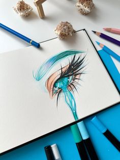 a drawing of a woman's eye with blue hair