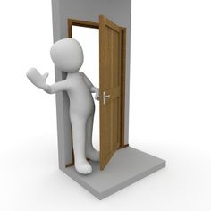 a person standing in front of an open door