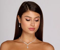 This teardrop rhinestone necklace and earring set will reflect pure glamour that will complement your evening look. It features a gorgeous rhinestone collar necklace and matching duster earrings, a perfect piece for bridesmaid jewelry. The teardrop charm embellishment will cascade down beautifully. Perfect for a wedding or any event you just want to feel elegant! Pair with a sleek satin dress and a chic handbag. Duster Earrings, Rhinestone Collar, Prom Jewelry, Rhinestone Heels, Chic Handbags, Necklace And Earring Set, Crystal Necklace Pendant, Silver Rhinestone, Rhinestone Necklace