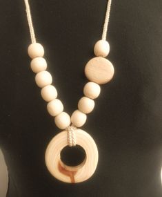 These simple necklaces will fit perfectly into a more variegated garment, will accentuate the uniqueness of it, but will not obscure it. They are made of natural raw wood, with a juniper pendant. The cord is crochet from two rows, the necklace is light, does not even feel worn. Wear it and always be beautiful. Handmade Natural Jewelry For Everyday, Adjustable Natural Wood Necklace Nature-inspired, Adjustable Artisan Natural Wood Necklace, Bohemian Round Natural Necklaces, Handmade Rustic Natural Jewelry, Rustic Adjustable Natural Necklace, Rustic Handmade Natural Jewelry, Rustic Natural Handmade Jewelry, Rustic Handmade Round Necklace