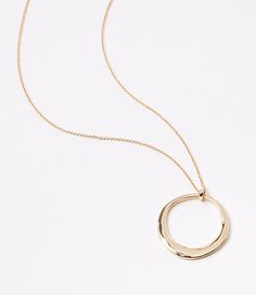 Sculptural and sleek, this circle pendant necklace rounds out your style with artful polish. Claw clasp. 30" long.,Imported:Imported Loft Modern Circle Pendant Necklace Goldtone Women's by Loft Size Regular - One Size Goldtone Women's Necklaces, Jewelry Round Metal Medallion Necklace, Tarnish Resistant, Round Metal Medallion Necklace Tarnish Resistant, Elegant Medallion Necklace With Lobster Clasp, Modern Round Chain Necklace With Polished Finish, Modern Round Chain Necklace With Adjustable Chain, Metal Chain Necklace With Round Pendant, Minimalist Metal Round Chain Necklace, Minimalist Round Metal Chain Necklace, Modern Circular Jewelry With Delicate Chain