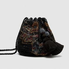 New With Tag Zara Handmade Black Crossbody Bag. Embroidered Bead Decorated Exterior. Drawstring Top Closure With Tassels. Lined Interior. Shoulder Strap. Height X Width Depth: 18 X 24 10 Cm / 7.0 X 9.4 X 3.9" Color: Black Ref. 2602/304/040 B2 Zara Pouch Shoulder Bag For Evening, Zara Crossbody Party Bag, Zara Crossbody Bag For Party, Multicolor Evening Bag With Mobile Phone Pocket, Evening Multicolor Mobile Phone Bag, Chic Beaded Pouch Shoulder Bag, Black Beaded Shoulder Bag, Black Beaded Bohemian Bags, Embellished Black Evening Shoulder Bag