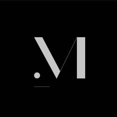 the letter m is made up of white and black letters on a black background with dots