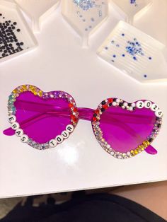 diy bedazzled eras tour costume sunglasses Sunglasses With Beads On Them, Eras Tour Glasses Diy, Eras Sunglasses, Bedazzled Accessories, Eras Tour Glasses, Eras Tour Sunglasses, Eras Tour Costume, Diy Bedazzled, Bedazzling Ideas