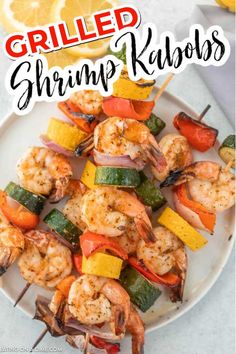 grilled shrimp kabobs on a white plate