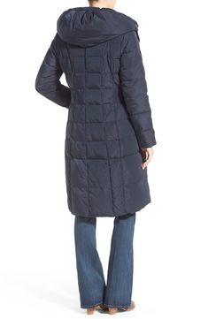 A bib insert topped with a stand collar adds another layer of cozy warmth to a box-quilted coat insulated with down-and-feather fill and topped with a lofty hood. Ruched side panels nip in the waist to add flattering definition to the silhouette. 40" regular length (size Medium) Storm placket with zip/snap closure; inner zip closure Inner stand collar Attached drawcord hood Long sleeves On-seam front pockets Lined, with 50% down, 50% feather fill 100% Fitted Down Outerwear For Work, Fitted Quilted Outerwear For Cold Weather, Classic Fitted Quilted Jacket For Winter, Down Feather, Quilted Coat, A Stand, Urban Outfits, Nordstrom Store, Cole Haan